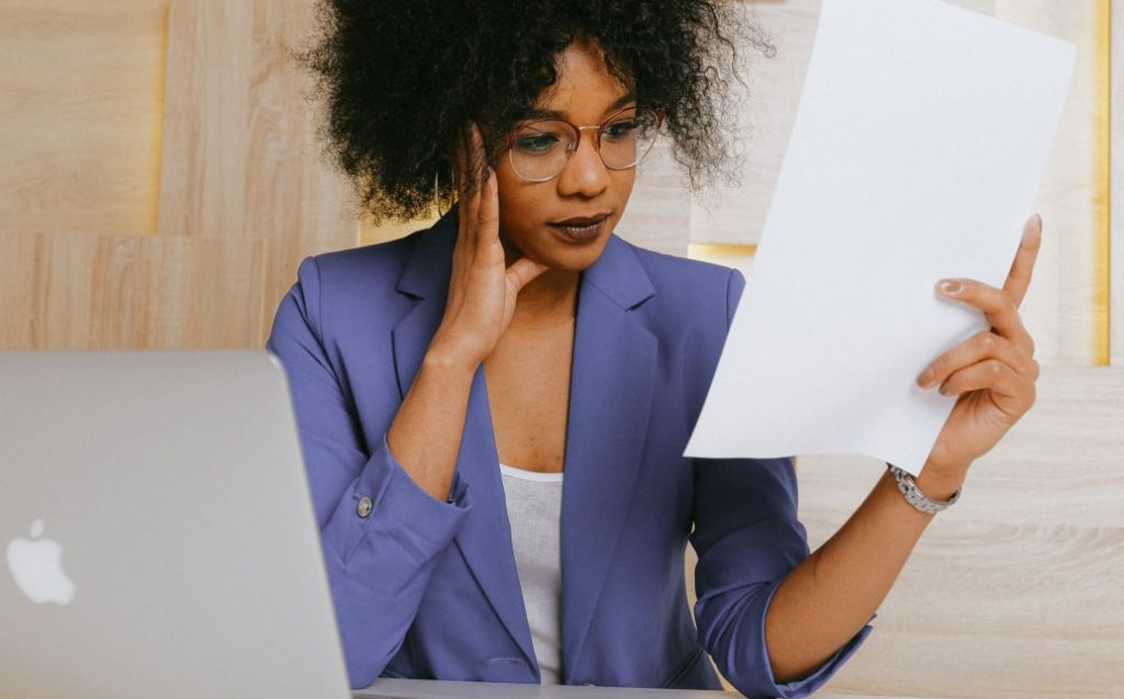 Woman studying a paper