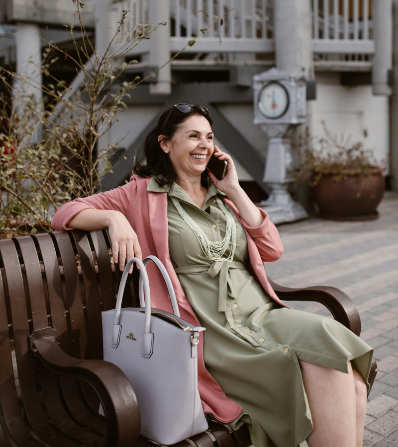 Woman smiling on the phone