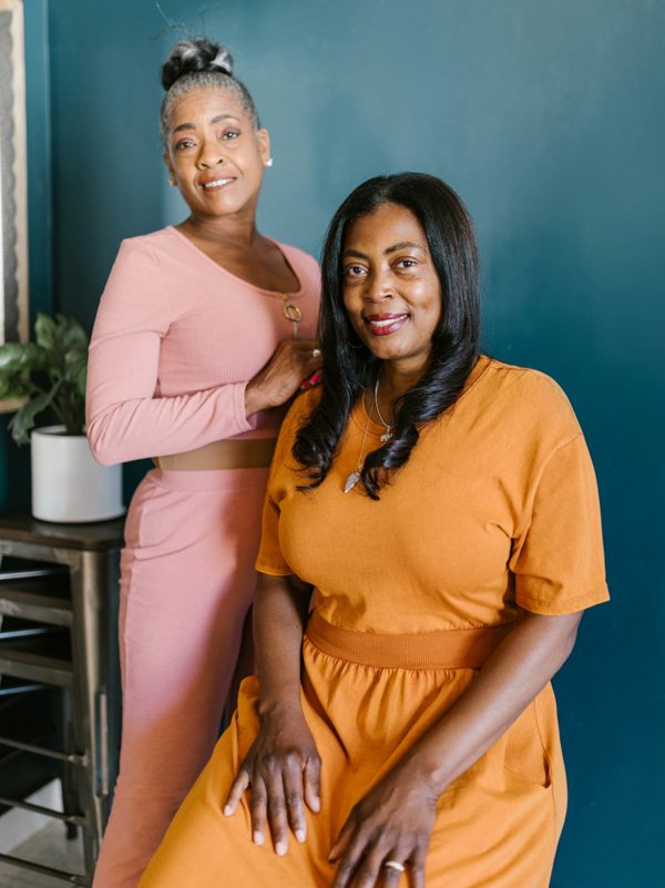 2 Women Smiling at the Camera