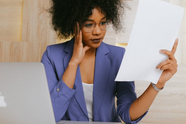 Woman studying a paper